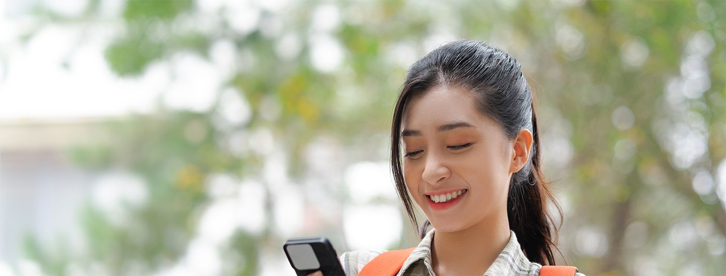 Student looking at phone