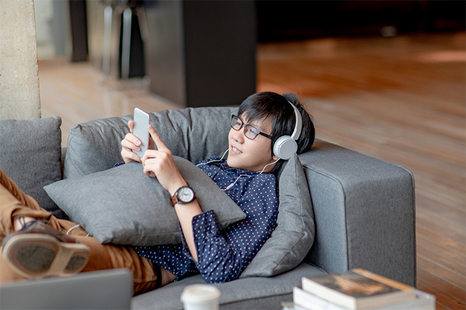 Student sitting on couch